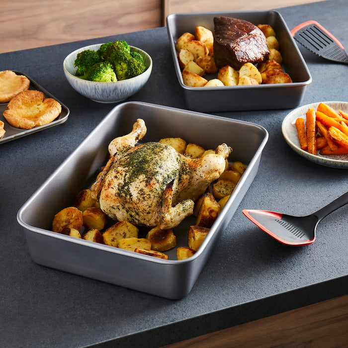 Meat and potatoes in a roasting tin