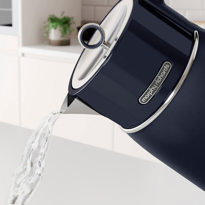 navy morphy richards kettle pouring water