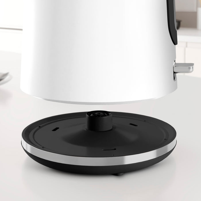 white kettle lifted from kettle base