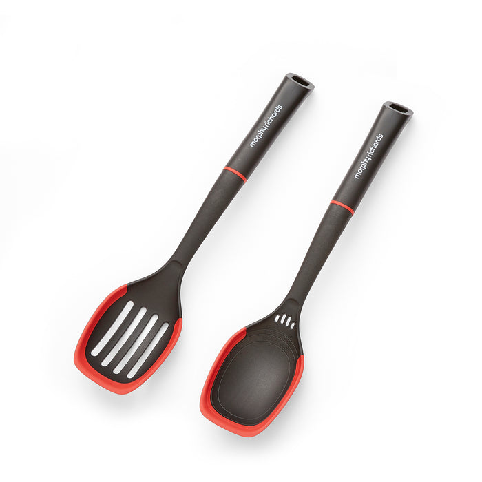 Two black and red kitchen utensils on a white background
