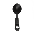 Black measuring spoon on a white background