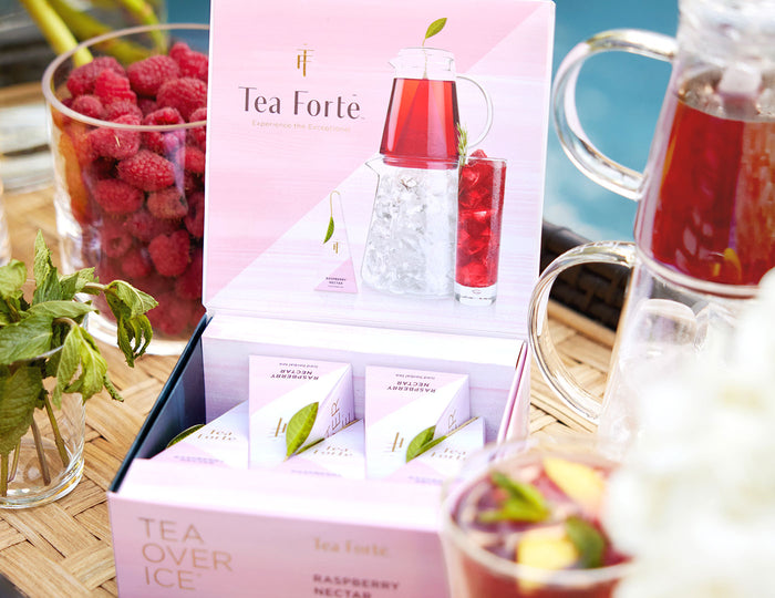 Tea Over Ice Raspberry Nectar 5pk open with iced tea and berries