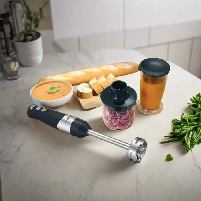 hand blender set with soup and bread around it