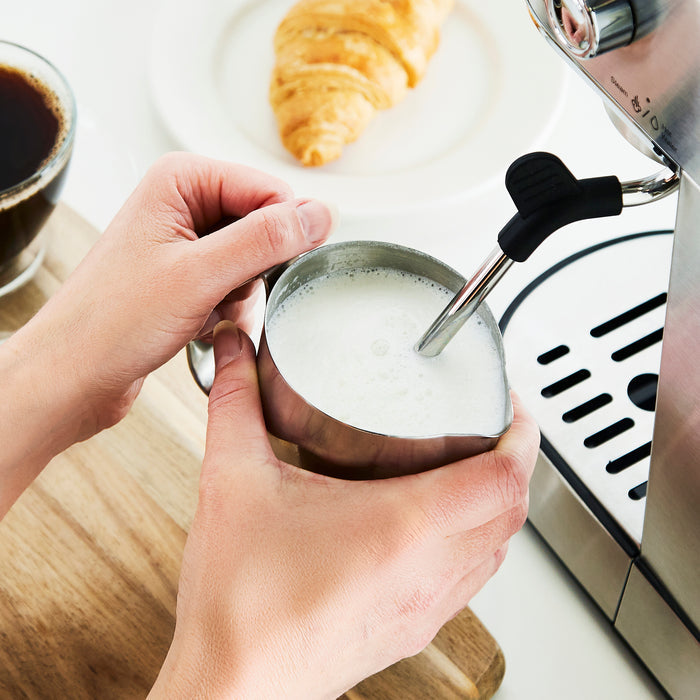 milk frother on coffee machine