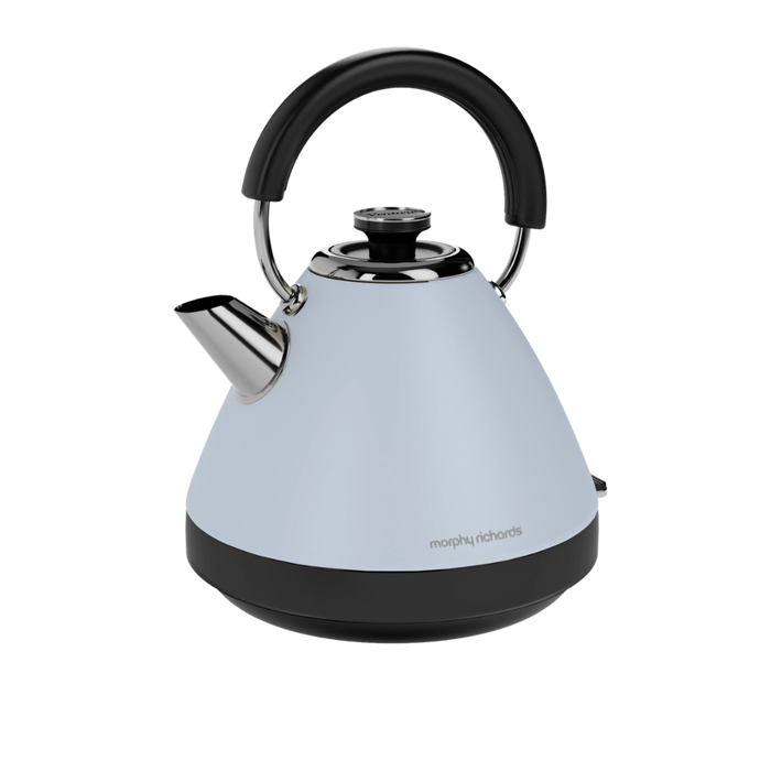 A duck egg blue pyramid-shaped electric kettle with a black handle and base, featuring a stainless steel spout and a removable limescale filter.