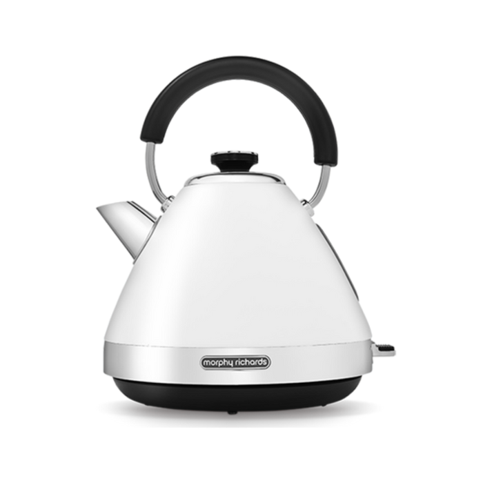 A white pyramid-shaped electric kettle with a black handle and base, displaying the brand name 'Morphy Richards' on the spout.