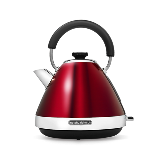 A red pyramid-shaped electric kettle with a black handle and spout cap, against a white background.