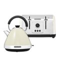 A cream-colored Venture brand kettle and toaster set with a timeless pyramid silhouette and vintage finish.