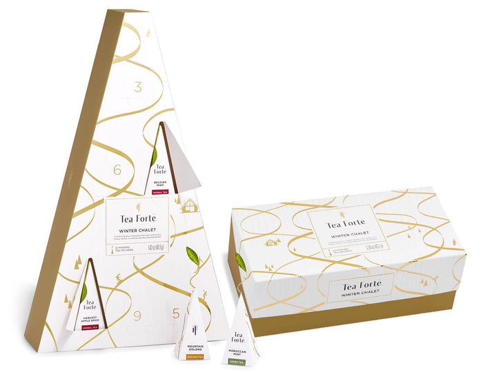 Tea Forte Winter Chalet gift set with triangular box containing tea packets and rectangular box with gold branch pattern desi