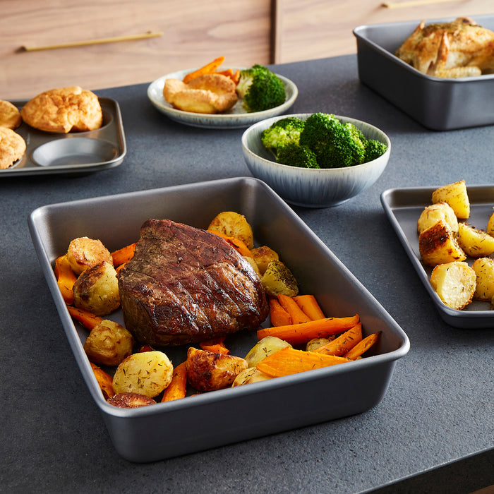Roasting Tin with beef, carrots and potatoes inside